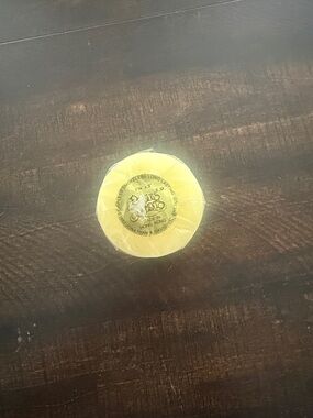 Precious Moments Yellow Wrapped Candle New. “God is love” John 4:8.